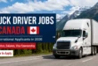 White semi-truck on a Canadian mountain highway for 2026 truck driver jobs in Canada with visa sponsorship.